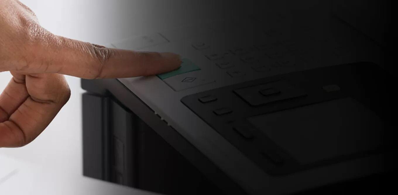 Hand Pressing a Button on a Fax Machine